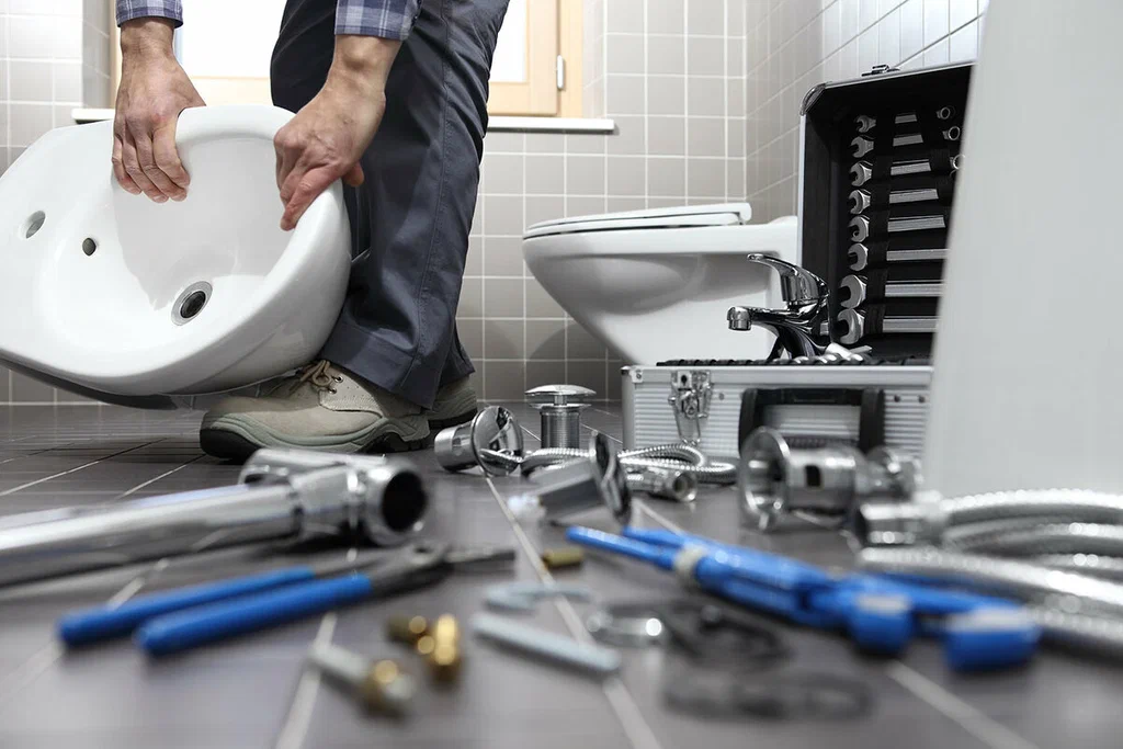 Plumbing tools prepared for a bathroom repair in Deerfield Beach